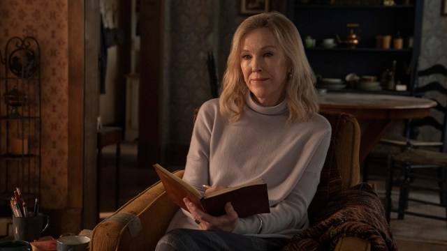 Gail sitting down holding a book in The Last of Us season 2