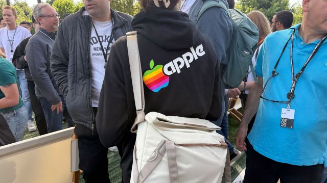 Images from around Apple Campus during WWDC 2025 including rainbow logos and graphics for Pride