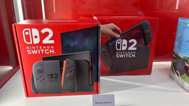 The Nintendo Switch 2 console boxes on a stand