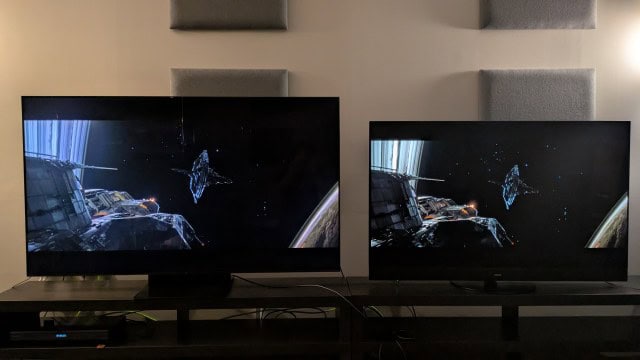 TCL C7K mini-LED left and Panasonic MZ1500 OLED right displaying a space scene from Alien:Romulus on screen