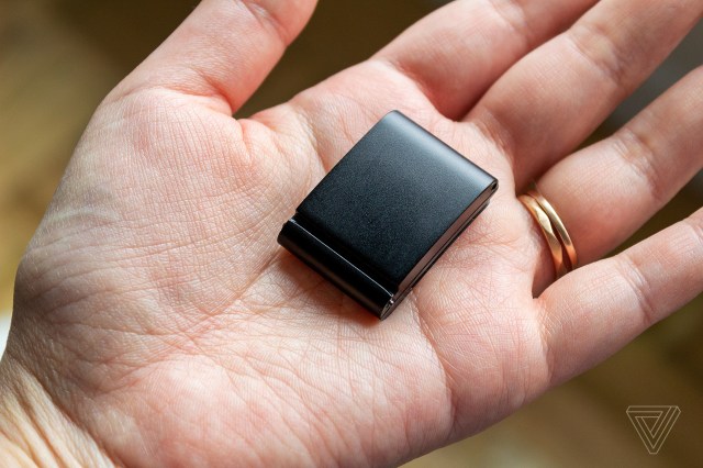 The Whoop 4.0 in the middle of someone’s hand