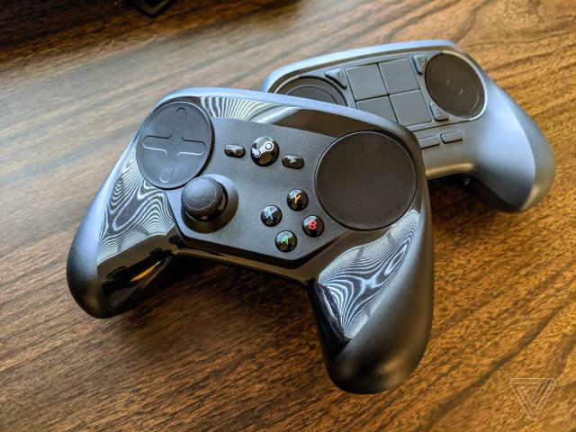 My original Steam Controller next to an earlier prototype.