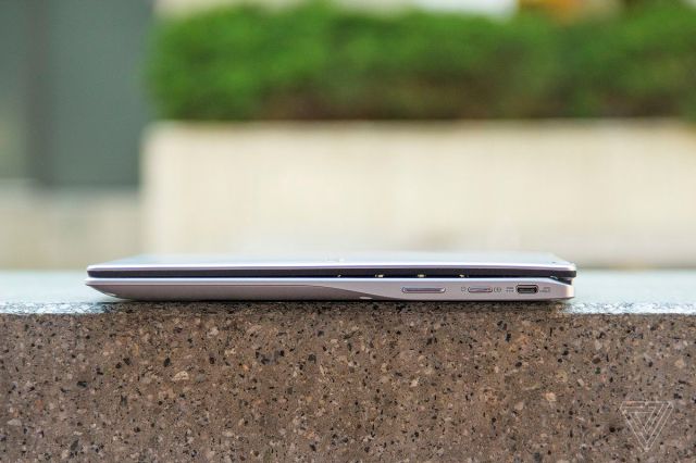The Acer Chromebook Spin 513 on a stone bench, closed, seen from the right side.
