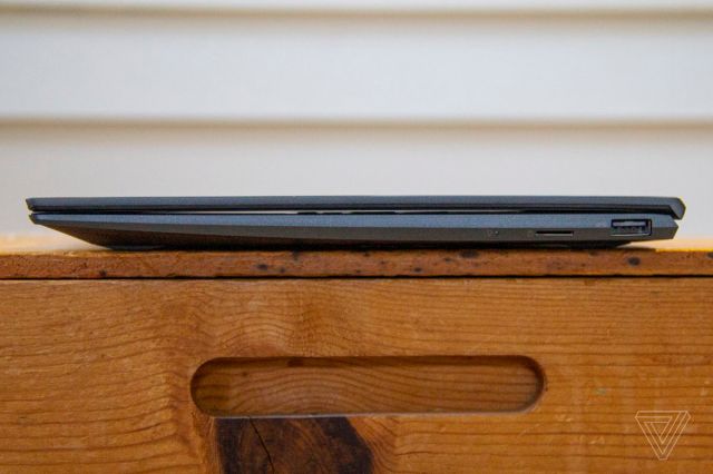 The Asus Zenbook 14 closed from the right side.