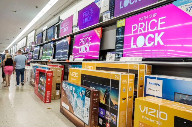 A photo showing the TV aisle at Walmart