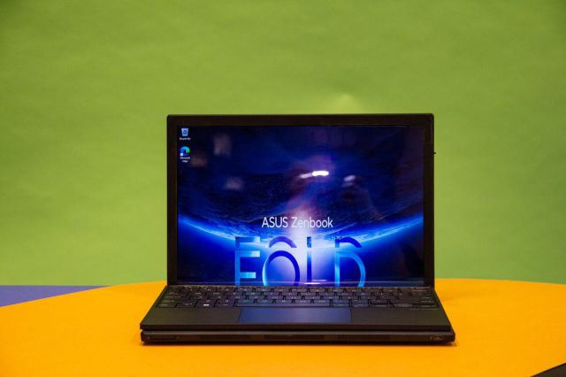 The Asus Zenbook 17 Fold OLED in laptop mode with the keyboard attached,