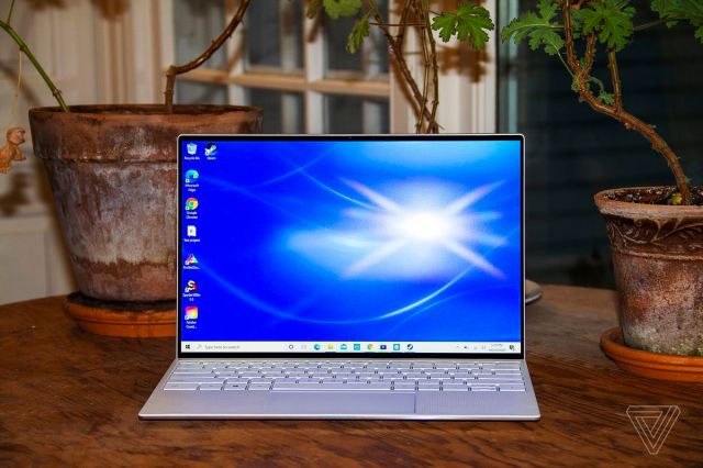 The Dell XPS 13 open, seen from the front.