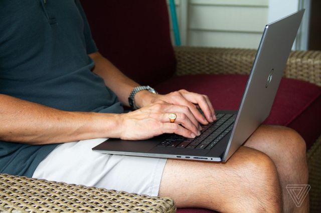 A user types on the Dell XPS 17.