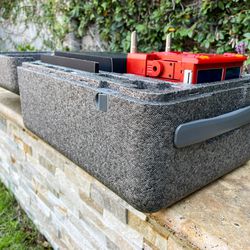Inside, there are perfect-fit wells for Optimus, an accessory box, manuals, the charger, and more.