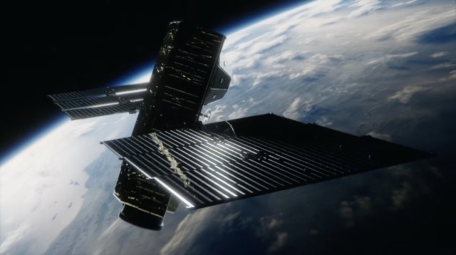 Image of a satellite floating in space above the earth