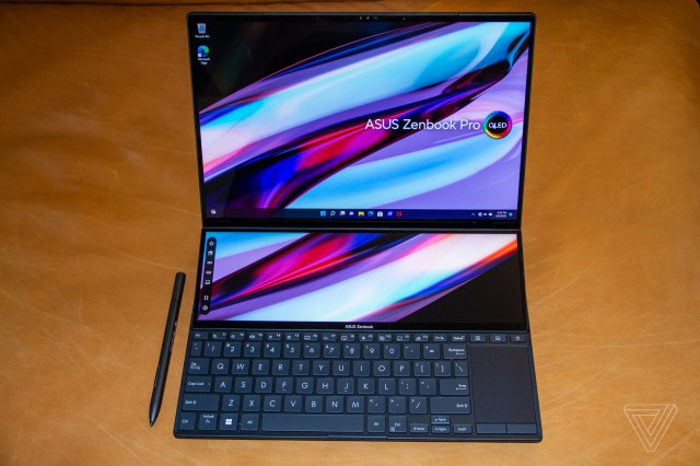 The Asus Zenbook Pro Duo 14 seen from above. Both screens display a multicolor background.