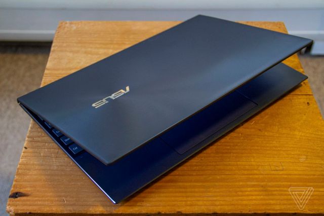 The Asus Zenbook 14 half closed from above.