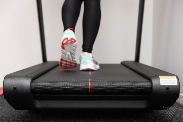 Closeup of the treadmill belt as someone runs on it
