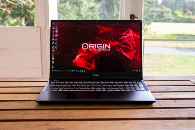 The Origin EVO15-S sits on a porch table.