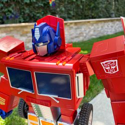 You can remove the red flap, it just pops off, but it serves to cover the top of the cab once the head is inside.