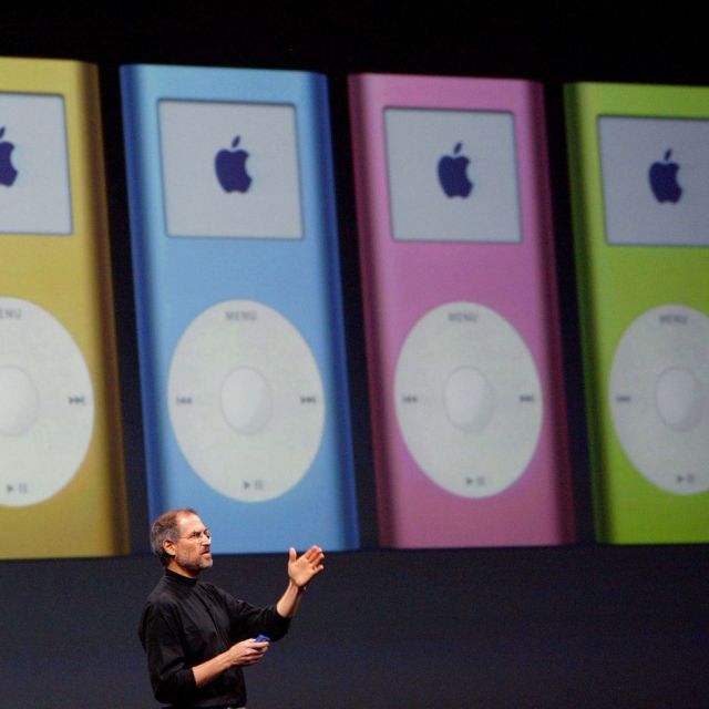 Apple CEO Steve Jobs announces the new mini iPod available in five colors during a keynote address at Macworld January 6, 2004 in San Francisco. Jobs announced several new products including the new iLife 4 software and the Mini iPod.
