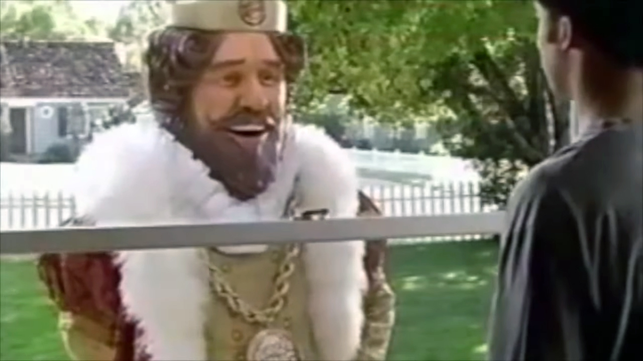 The Creepy King BK mascot standing outside a person's window, staring at them silently.