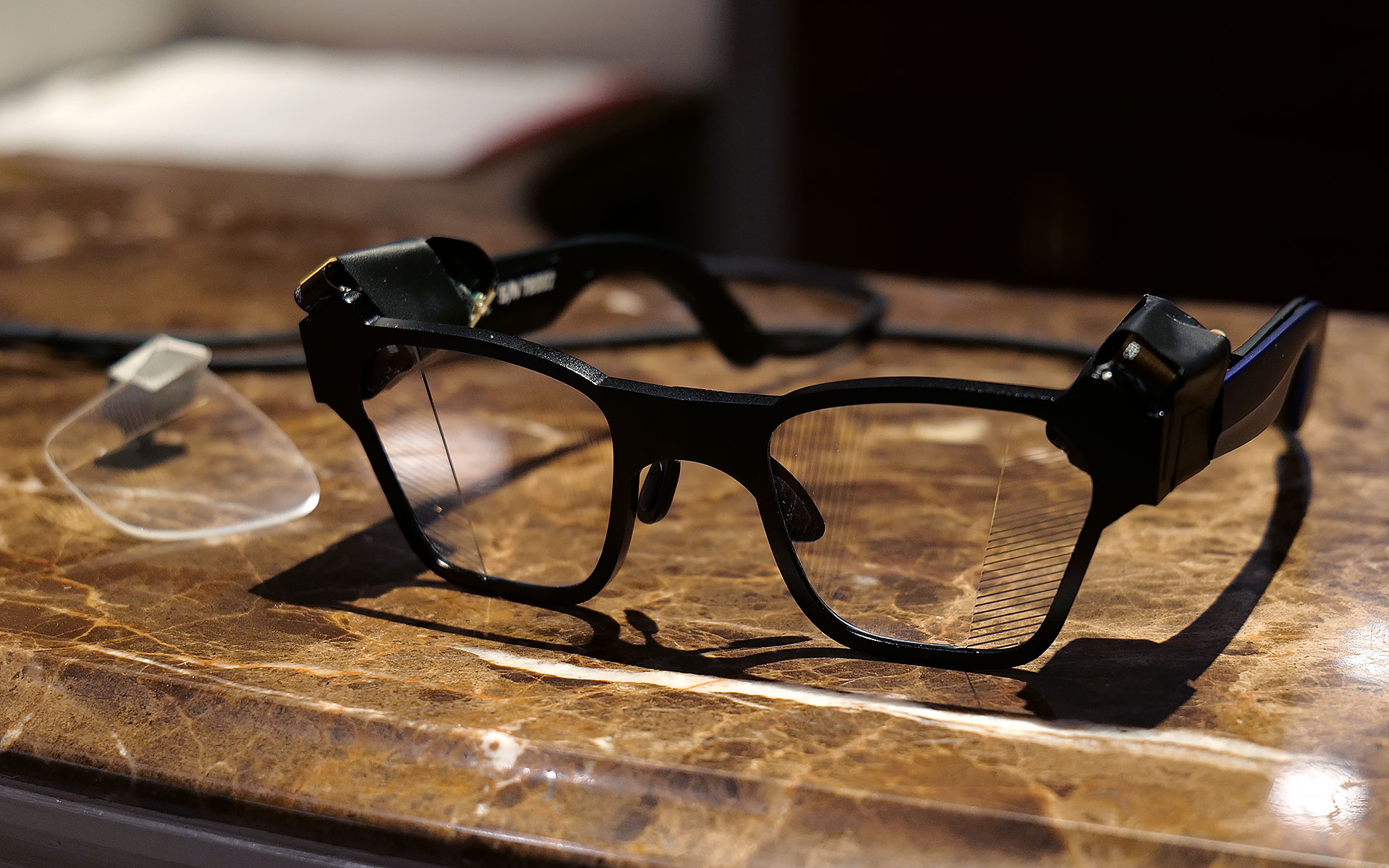 I had to take a photo of one of Lumus' non-functioning smartglasses with the company's 70-degree FOV waveguide, because two out of three of the working ones had already broke and the last one that I used was being held together by tape. 