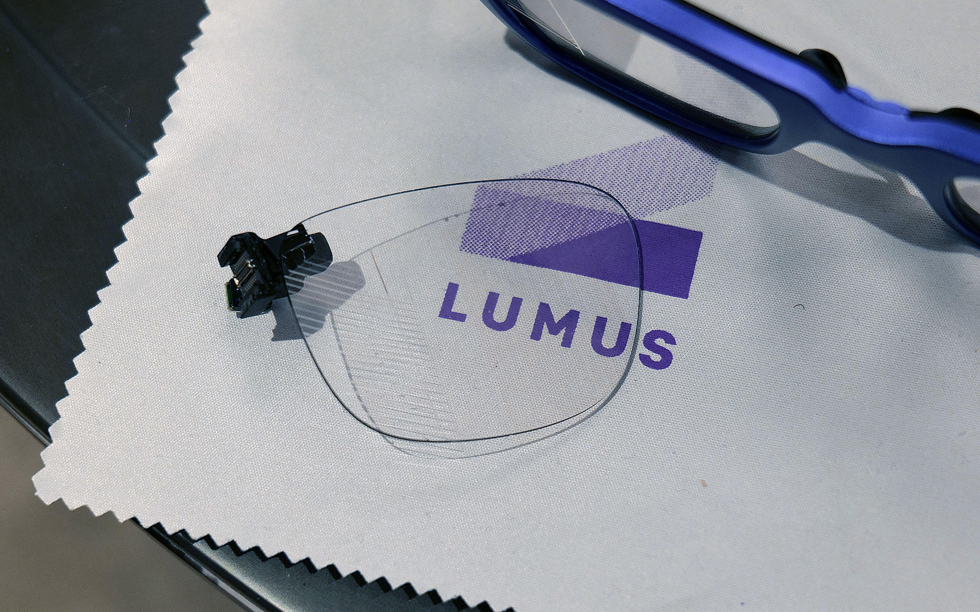 If you look closely, you can see where light from the waveguide propagates into the one of the smartglasses' lenses.