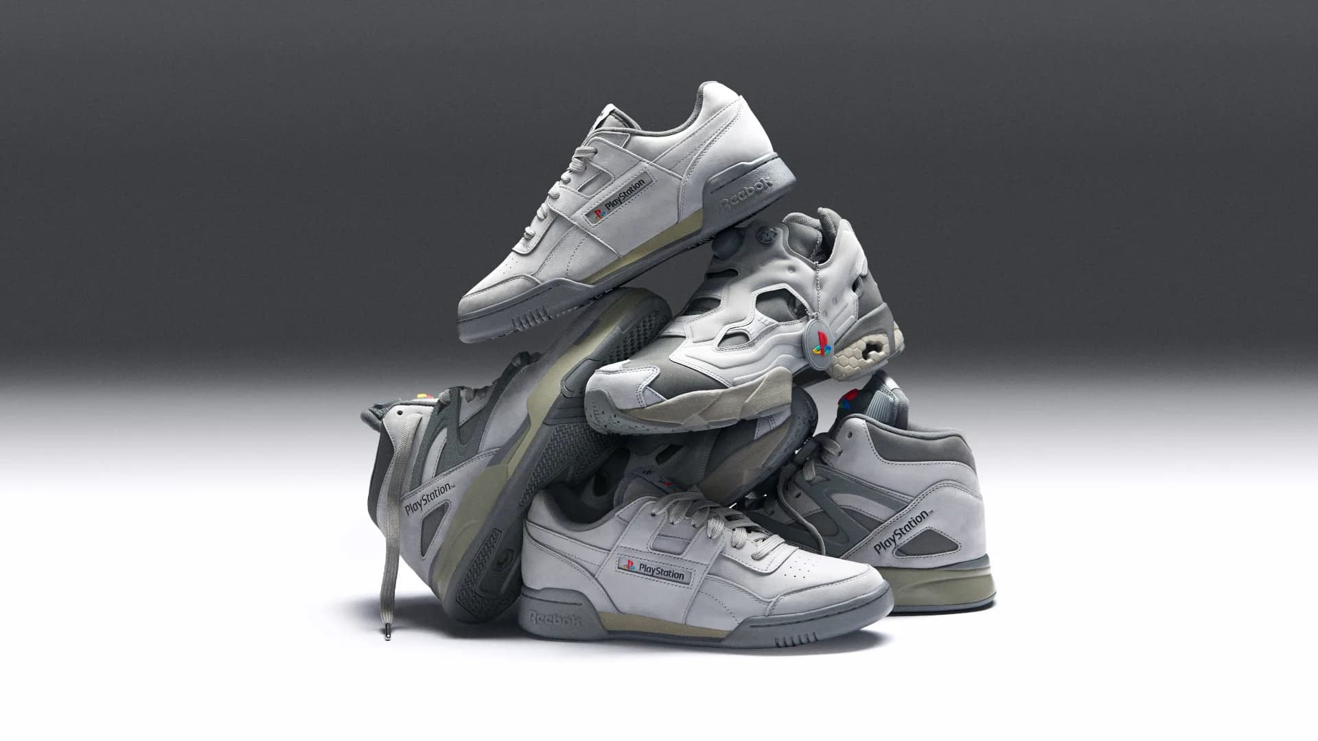 An assortment of Reebok sneakers based on the design of the original PlayStation.