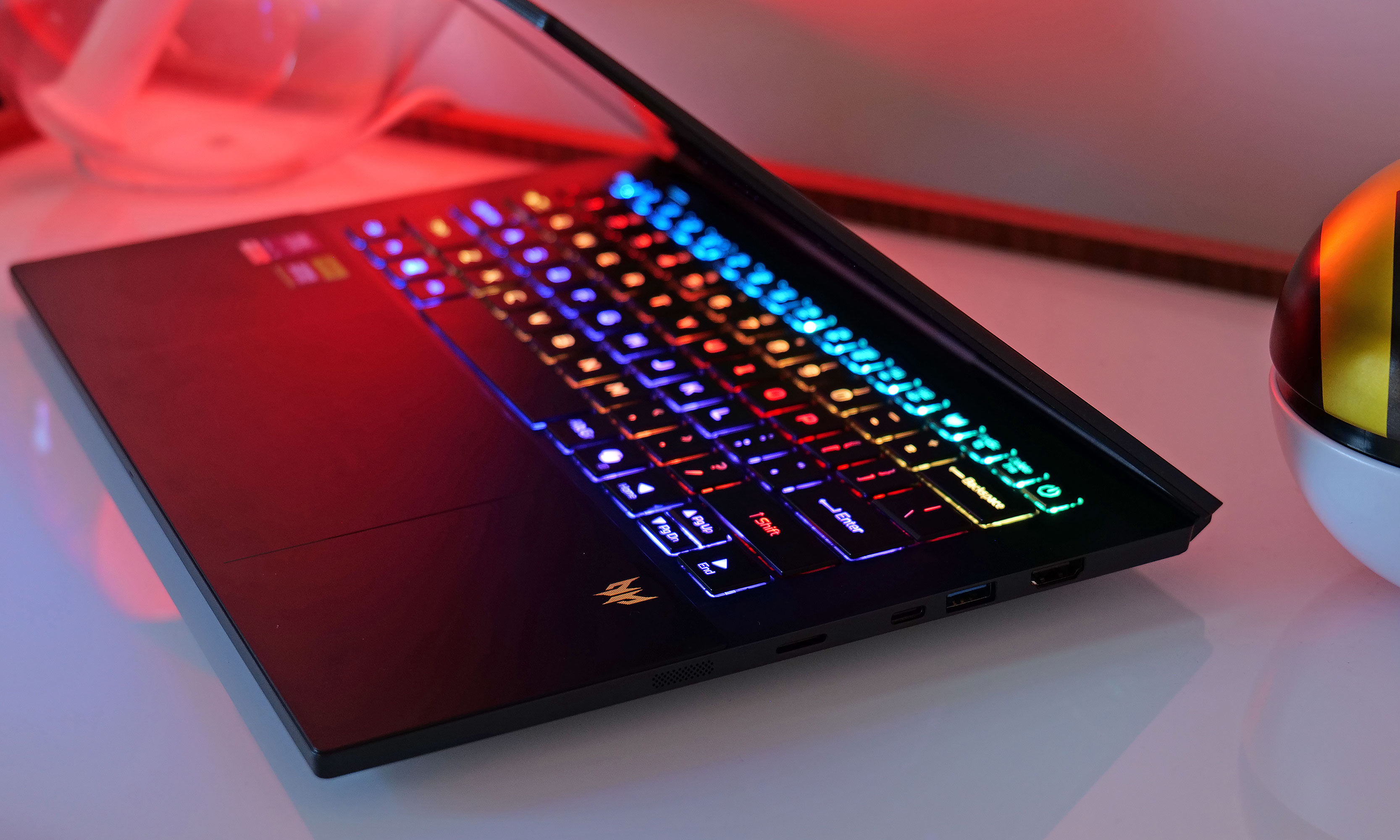 The Acer Predator Triton 14 AI's right side features a microSD card reader, two USB ports (one Type-C and one Type-A) and a full-size HDMI jack. 