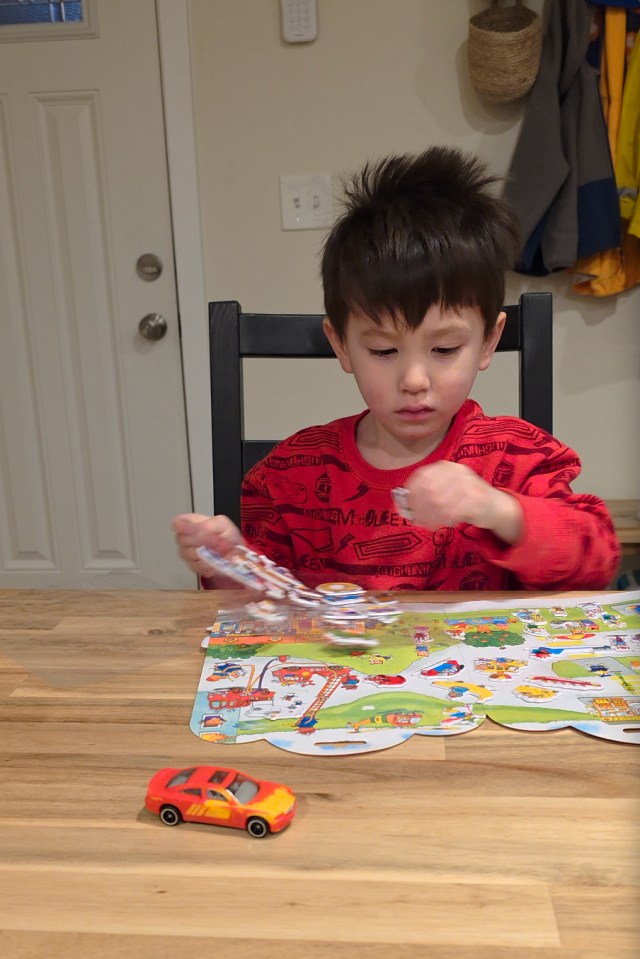 Screengrab of a video from the S25 Ultra of a child sitting at a table playing with stickers