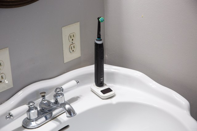 I also tested a wireless toothbrush charger. The prototype device had some issues with water-resistance, but the Wi-Charge transmitter installed in the ceiling of my bathroom kept it powered up.