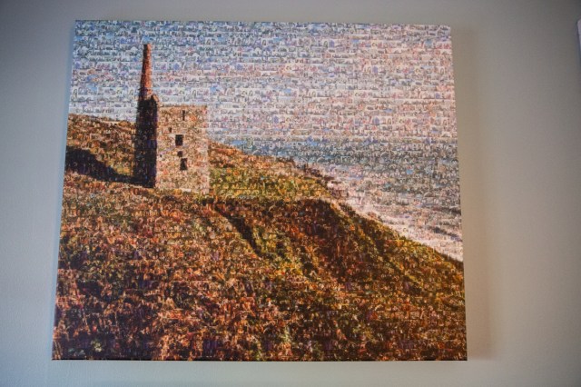 A close up of a pixelated photo of a sea shore