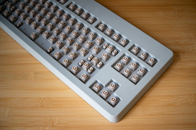Custom switches, custom stabilizers, and a 5mm chromed brass switchplate.
