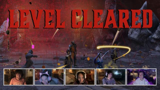 A group of video game character dancing in a spray of blood in a dungeon. Across the top of the screen the words “level cleared” are written in bold red letters. Across the bottom of the screen are five boxes depicting people on a group video call.