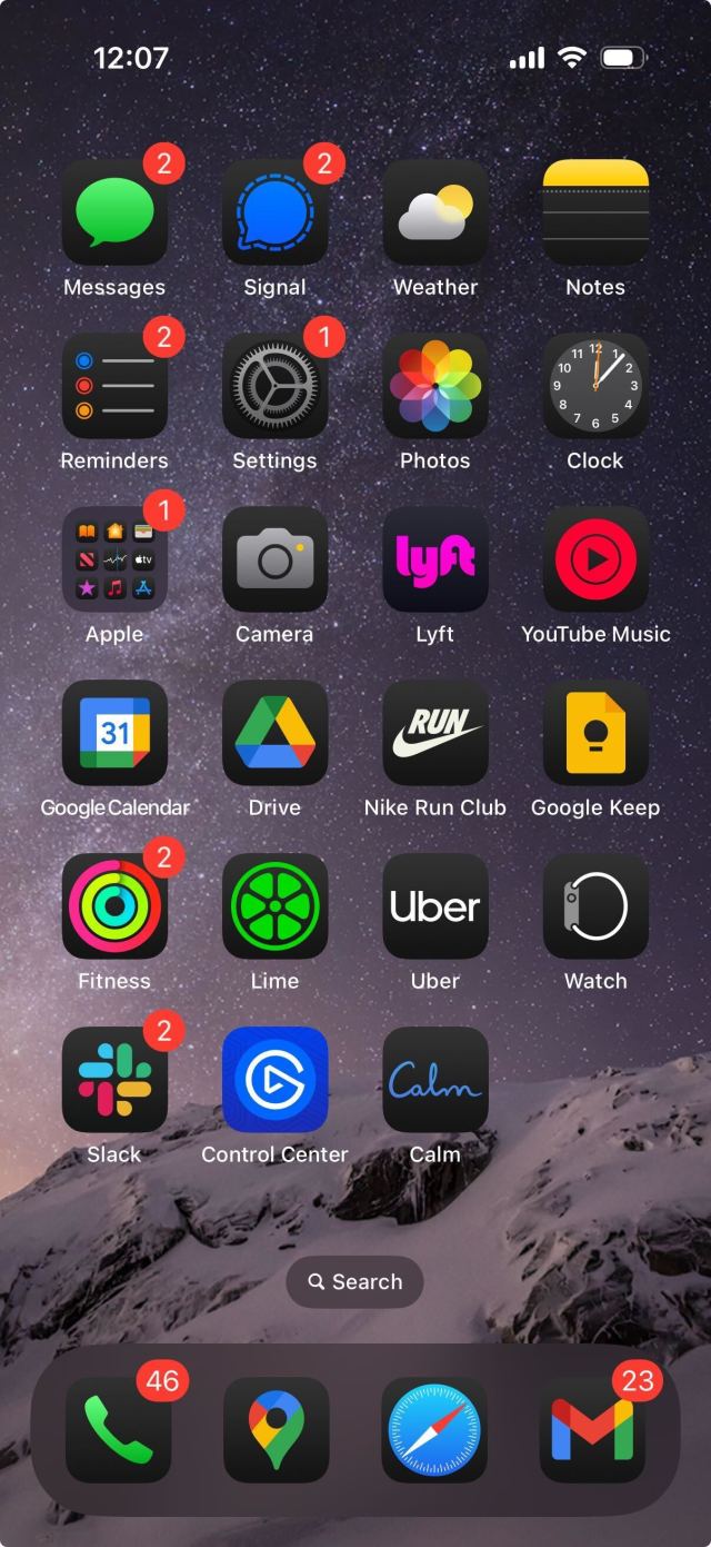 An iPhone homescreen with a dark background.