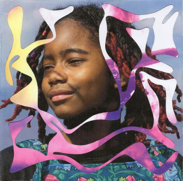 Hand cut photo collage of a young girl’s face overlayed with art from the game Final Fantasy XIV.