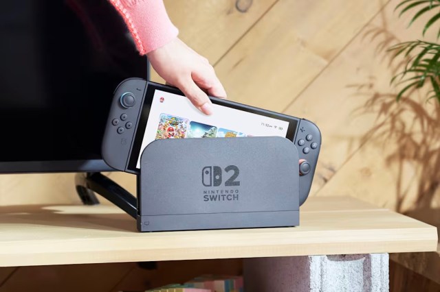 An image of someone removed the Nintendo Switch 2 from its dock.