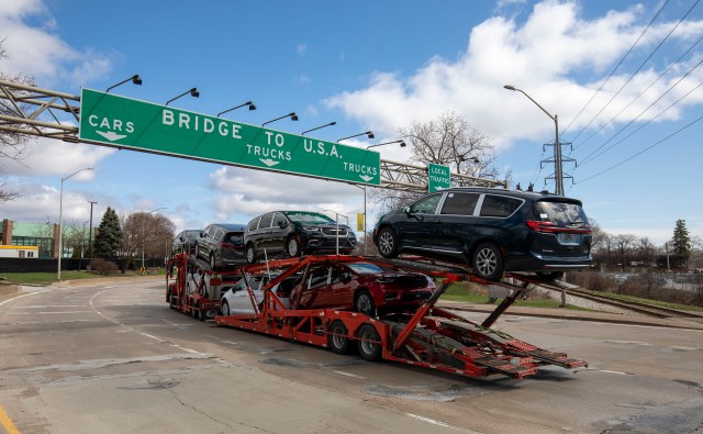 A car hauler truck makes its way to the Ambassador Bridge to cross into the United States on April 1st, 2025, in Windsor, Canada.