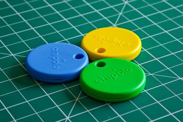 Three Chipolo Pop trackers in yellow, green, and blue