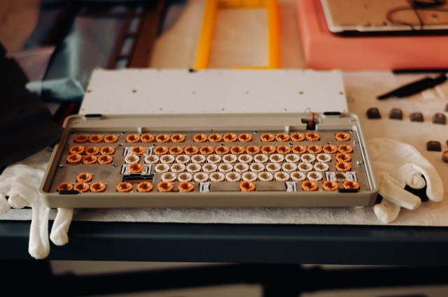 A Seneca mid-assembly, viewed from the underside. You can see the flexible dome and conical spring for each key, before the PCB is attached. The modifiers use heavier domes than the alpha keys by default.