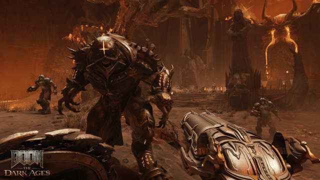 Screenshot from Doom The Dark Ages featuring the perspective of the slayer facing down a demon holding the super shotgun.