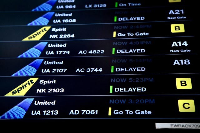 A screen displaying flight status is seen at Newark Liberty International Airport in Newark, New Jersey on May 7, 2025.