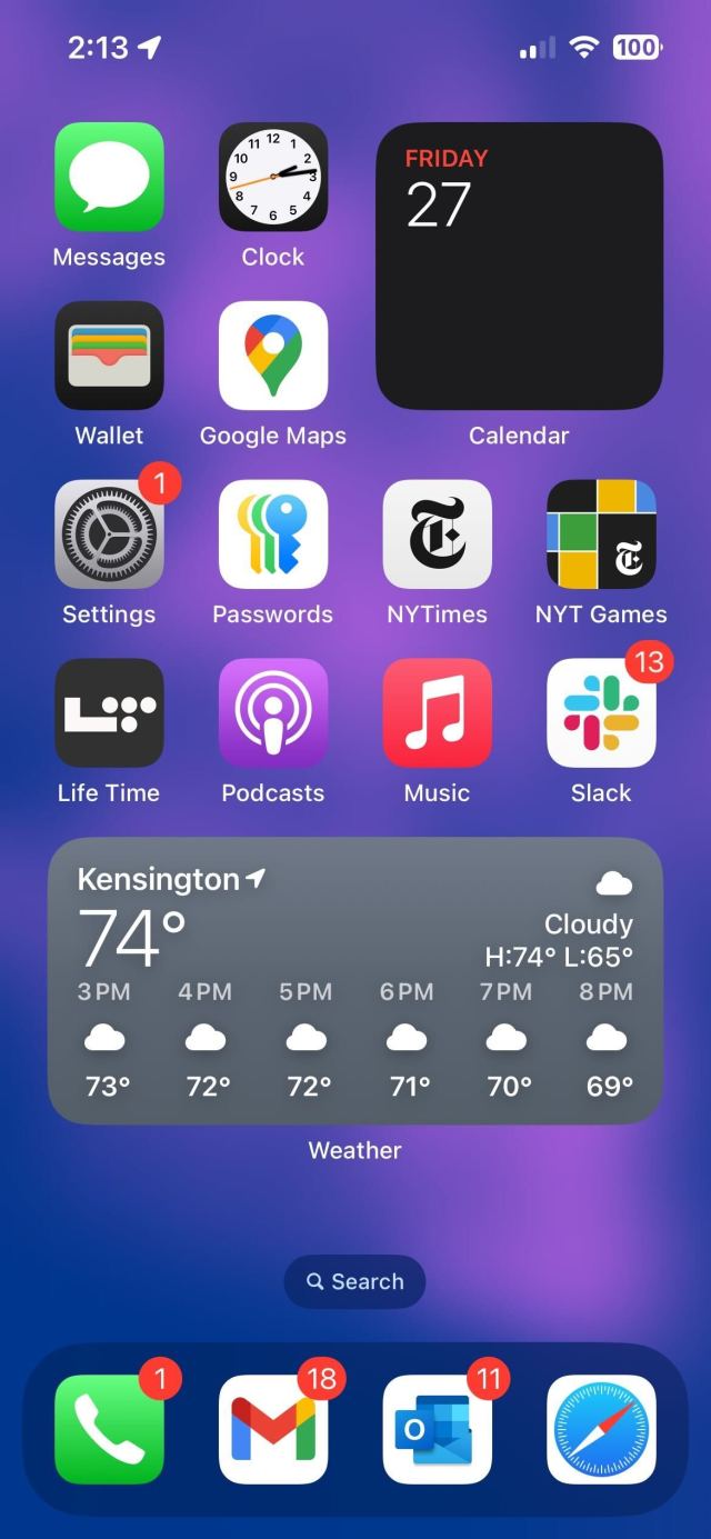 A homescreen of an iPhone with a purple background.