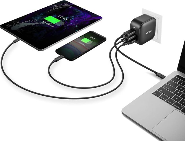 Charger connected to a laptop and phone.