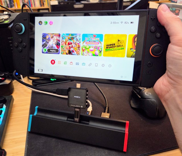 A third-party Switch dock, plugged into a USB-C PD tester, about to be plugged into the Switch 2. Please forgive the terrible photo.