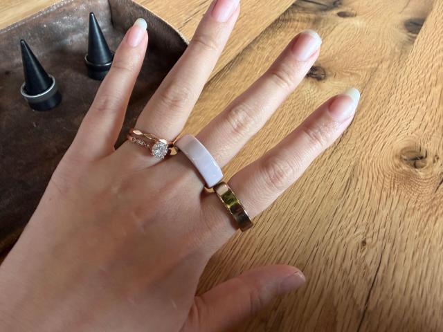 The Oura Ring 4 in ceramic on my middle finger. The Oura Ring 5 is on my index finger.