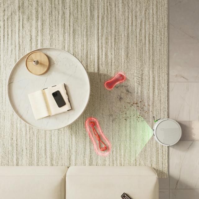 The Roomba 575 features a 46% more compact design than the 505, making it easier to fit under furniture and navigate tight spaces.
