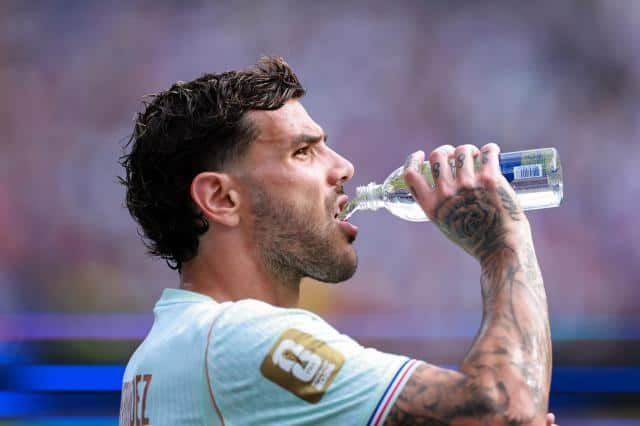 Theo Hernandez of France drinks from a water bottle during the FIFA World Cup 2026 Group I match between Norway and France at Boston Stadium on June 26, 2026 in Foxborough, United States. 