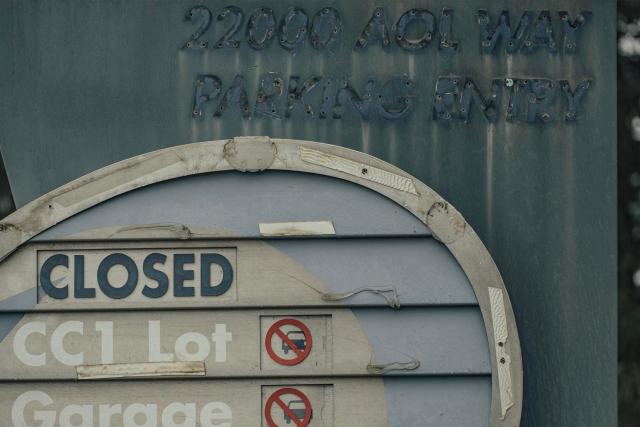 A dilapidated sign on AOL Way showing the site of the company’s first data center in Loudoun County.