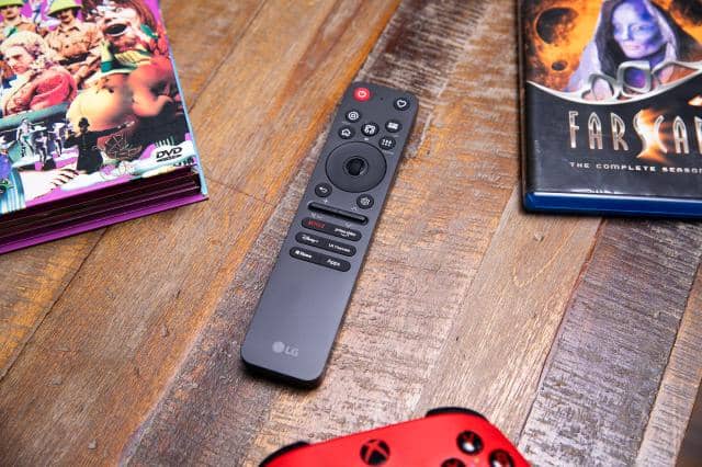 LG MRGB95B RGB LED TV remote on a wooden table.