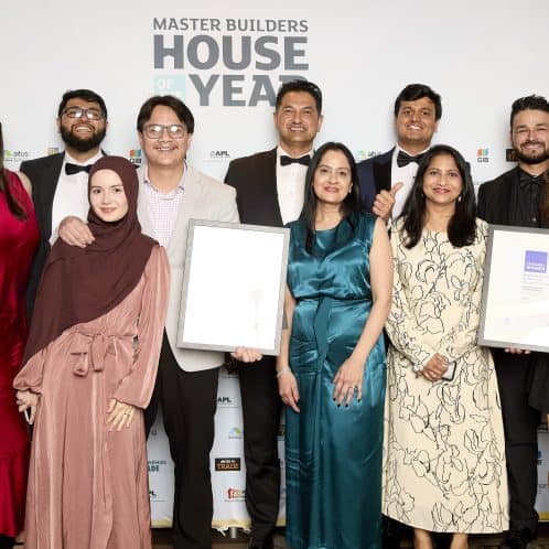Award-winning team celebrating at the House of the Year awards ceremony in New Zealand, showcasing excellence in construction and craftsmanship.