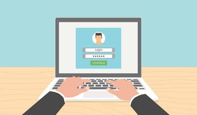 Log in account on the laptop. Hands on the laptop.