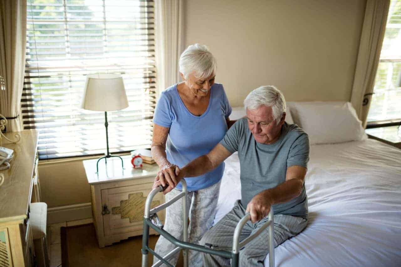 Man Recovering At Home From Total Knee Replacement
