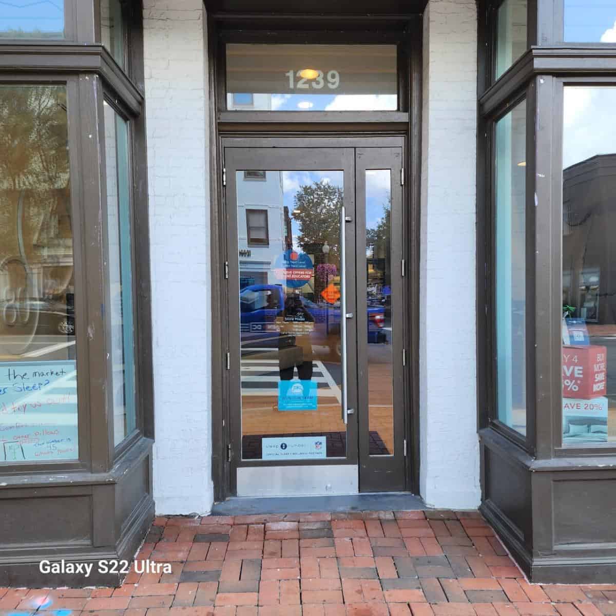 Locksmith Germantown A Glass Door With Brown In The Corner And White Beam Successfully Installed The Access Control By King Locksmith Germantown Md.